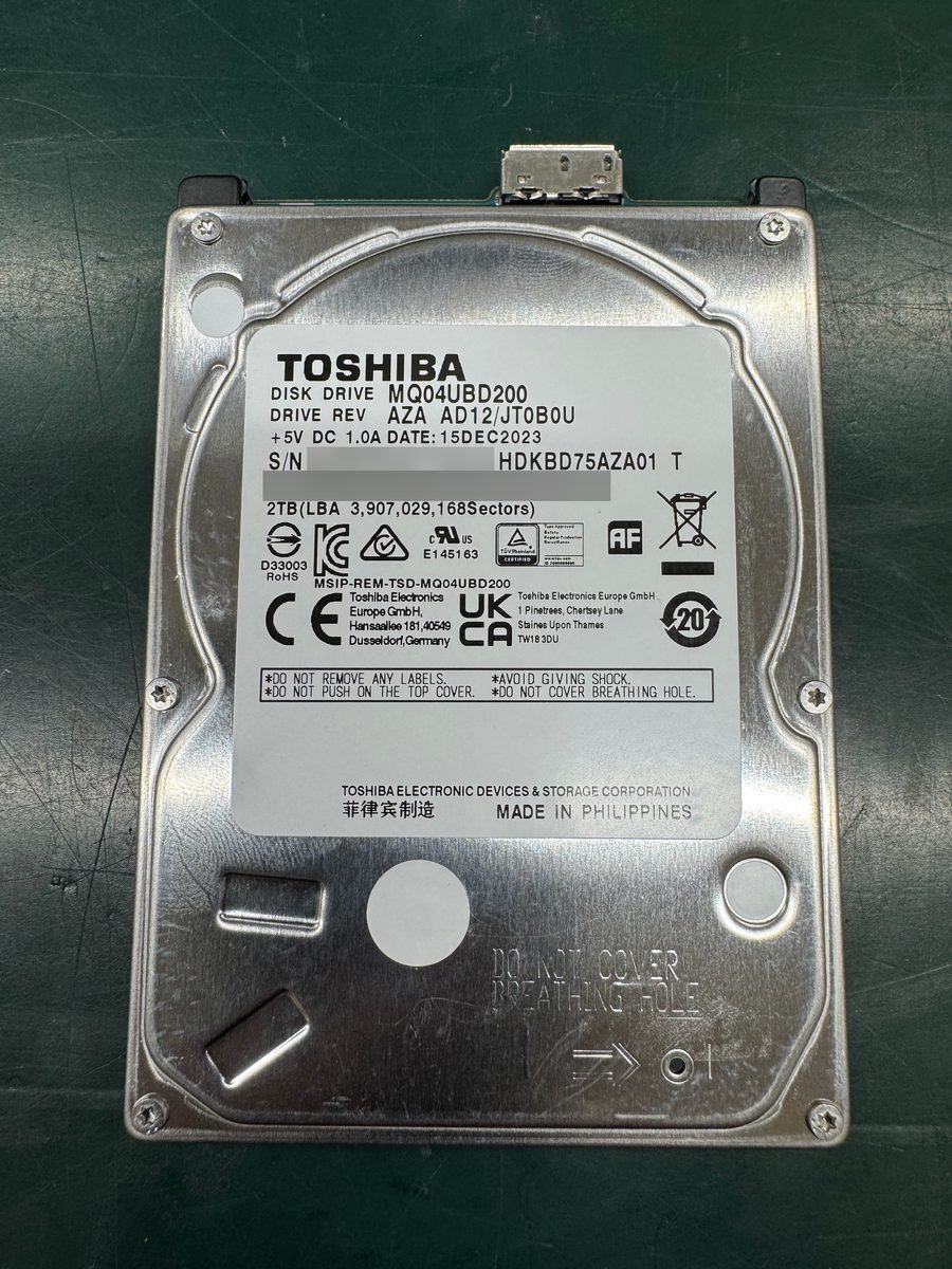 ラベル情報を保護した東芝MQ04UBD200（2TB）の障害HDD