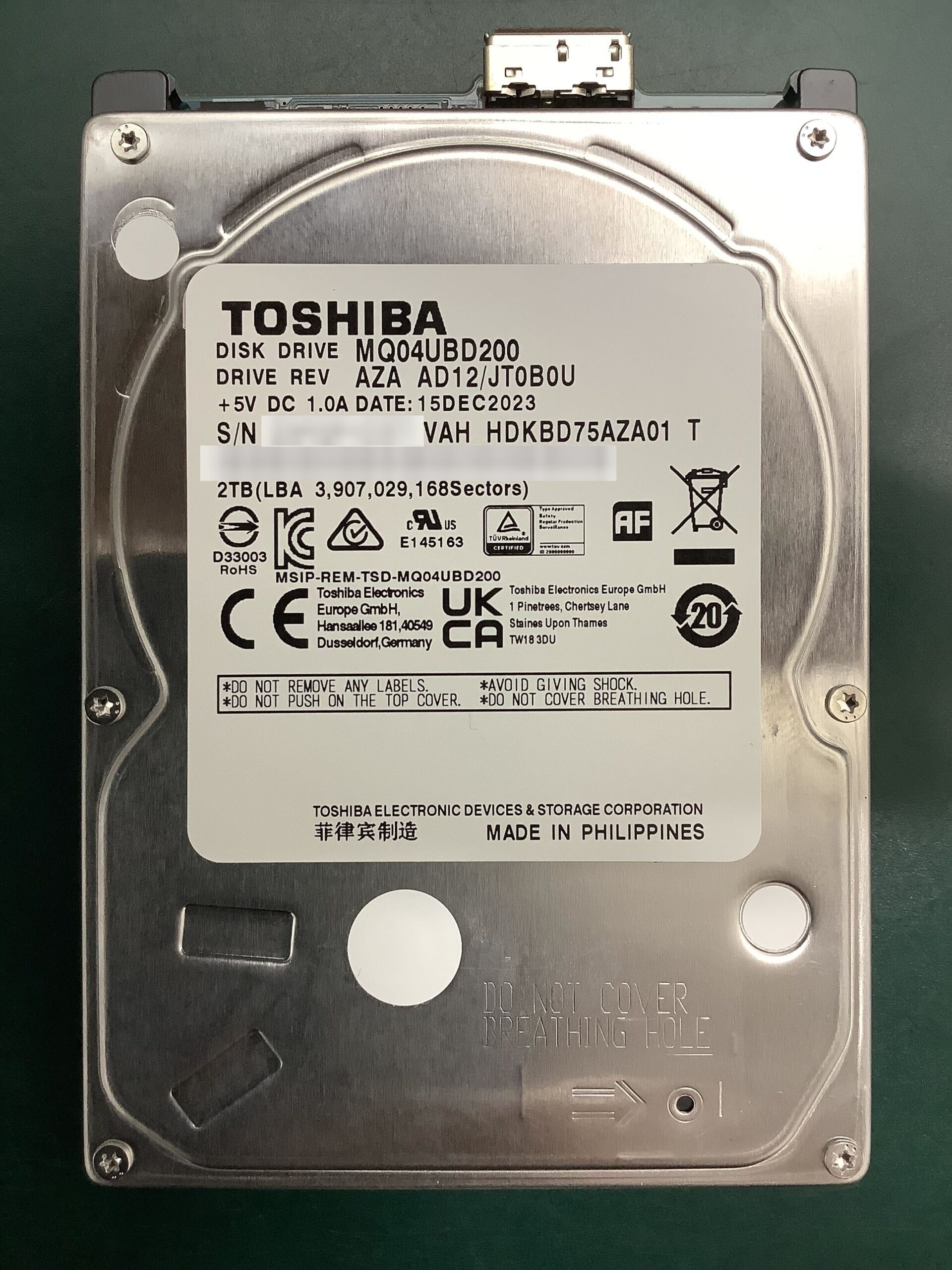 東芝 MQ04UBD200(2TB)のラベル|異音がして認識しない外付けHDDのデータ復旧事例